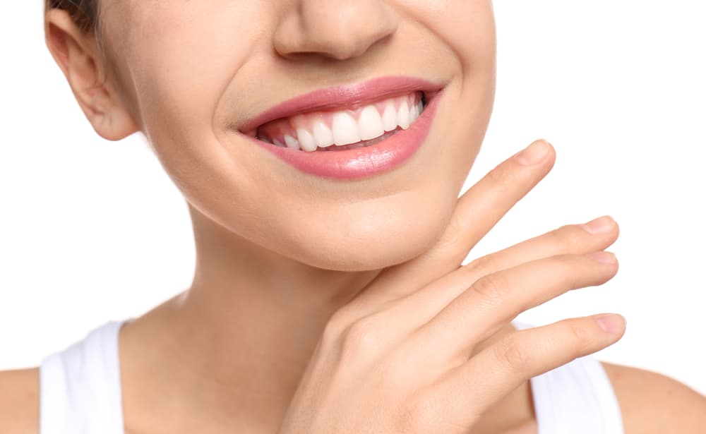 A patient with a confident, healthy smile